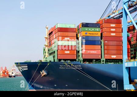 Qingdao, China. 29th Sep, 2021. QINGDAO, CHINA - SEPTEMBER 29, 2021 - A foreign ship loads goods at the fully automated wharf of Qingdao Port in Shandong Province's Pilot Free Trade Zone in Qingdao, East China's Shandong Province, Sept. 29, 2021. (Photo by Zhang Jingang/Costfoto/Sipa USA) Credit: Sipa US/Alamy Live News