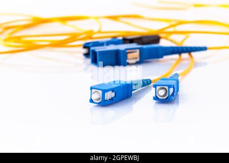 Fiber Optics connectors symbolic photo for fast internet connection ,Internet Service Provider equipment.broadband connection is  available everywhere Stock Photo