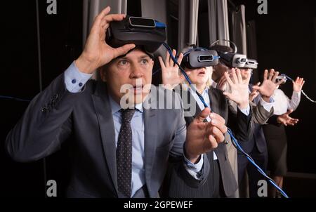 Man wearing virtual reality glasses Stock Photo