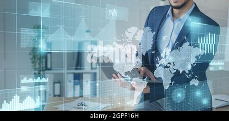 Business analyst using laptop. Technology and accounting concept. Double exposure Stock Photo