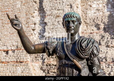 Roman emperor Trajan bronze statue at London Wall Tower Hill England UK which is a popular tourist holiday travel destination and attraction landmark, Stock Photo