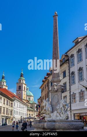 09.08.2021: Ljubljana, Slovenia: Ljubljana old town center with robba fountain and people . Stock Photo