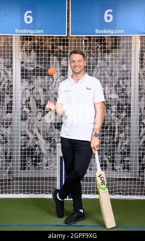 EDITORIAL USE ONLY England cricketer, Jos Buttler takes part in a batting challenge at Sixes Social Cricket in London ahead of the ICC Men's T20 World Cup 2021 to mark his appointment as ambassador for Booking.com, the official accommodation booking partner of the tournament. Picture date: Wednesday September 29, 2021. PA Wire. The tournament takes place from Sunday October 17 to Sunday November 14, 2021 in the UAE and Oman. Photo credit should read: Jonathan Hordle/PA Wire Stock Photo