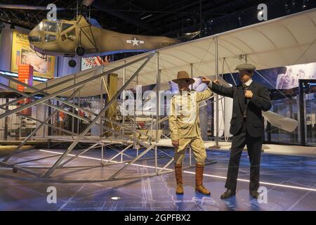 Figures of the Wright Brothers in front of their Flyer airplane. At the National Museum of the United States Army at Fort Belvoir, Virginia. Stock Photo