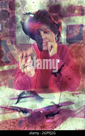 Austin Texas USA, circa 1989: Anglo woman balances the household checkbook. MR RE-180  ©Bob Daemmrich Stock Photo