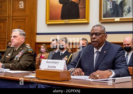 United States Secretary of Defense Lloyd J. Austin III, right, offers his opening remarks during a House Armed Services Committee hearing on “Ending the U.S. Military Mission in Afghanistan” in the Rayburn House Office Building in Washington, DC, Wednesday, September 29, 2021. Credit: Rod Lamkey/Pool via CNP /MediaPunch Stock Photo