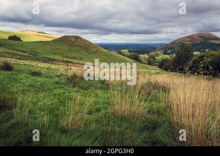 Robins Tump, a Bronze Age burial mound below Caer Caradoc Hill in the Shropshire Hills near Church Stretton. Stock Photo