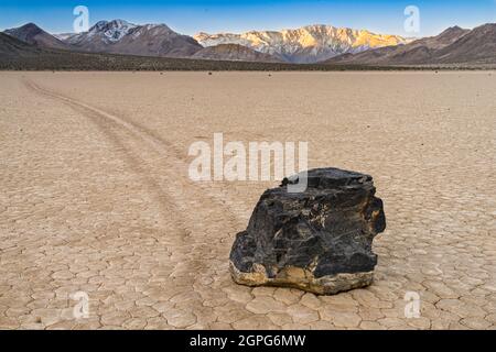 The Racetrack Playa, or The Racetrack, is a scenic dry lake feature with 'sailing stones' that inscribe linear 'racetrack' imprints. It is located abo Stock Photo