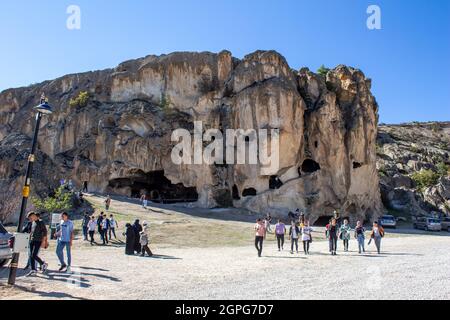 Afyonkarahisar, Turkey - September 26, 2021: People are visiting ancient caves in the Phrygian Valley. Phrygian Valley is a historical place in Turkey Stock Photo