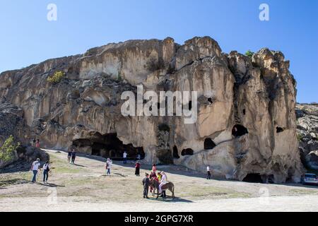 Afyonkarahisar, Turkey - September 26, 2021: People are visiting ancient caves in the Phrygian Valley. Phrygian Valley is a historical place in Turkey Stock Photo