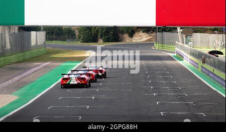 Vallelunga, italy september 19th 2021 Aci racing weekend. Spectacular rear view of three italian legends Ferrari 488 GT on straight track with Italy f Stock Photo