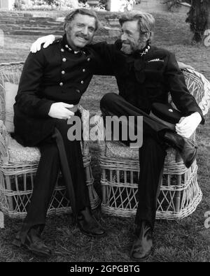 BURT LANCASTER in costume as Colonel Durnford and PETER O'TOOLE in costume as Lord Chelmsford on set candid during filming of ZULU DAWN 1979 director DOUGLAS HICKOX original story and scenario Cy Endfield screenplay Anthony Story music Elmer Bernstein costumes John Buckley Netherlands - USA co-production Zulu Dawn NV / Lamitas / Samarkand Stock Photo