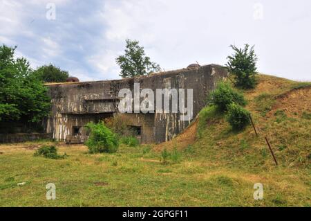 Rue de Latiremont, France, July 12, 2010. The Gros Ouvrage of Latiremont is located 10km to the East of Longuyon in France. From September 1939 to June 1940, Latiremont fired 14,452 75mm rounds and 4,234 81mm rounds at German forces and in support of neighboring units. The Ouvrage has the standard entrances, Both entrances can be viewed at the same time due to the layout of the fort. The access to the main gallery is by lift in the munitions entrance and by staircase in the men's entrance. The fort has 6 blocks - 3 artillery and 3 infantry. More than 1,200 metres (3,900 ft) of underground gall Stock Photo