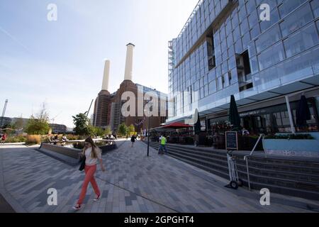 Battersea power station in London, with Circus West Village new developed shopping area on Southbank of River Thames Stock Photo