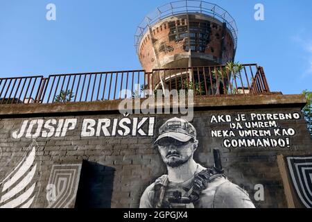 Croatia, Slavonia, Vukovar, the water tower, symbol of the city's resistance against the enemy during the siege of Vukovar in 1991, hit more than 600 times in 3 months, now a memorial, soldier's fresco Josip Briski died in Afghanistan in 2019 Stock Photo