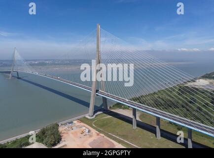France, between Calvados and Seine Maritime, the Pont de Normandie (Normandy Bridge) spans the Seine to connect the towns of Honfleur and Le Havre (aerial view) Stock Photo