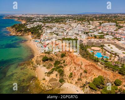 Portugal, Algarve, Albufeira, Praia do Barranco das Belharucas beach, hotel TUI Blue Falésia (aerial view) Stock Photo