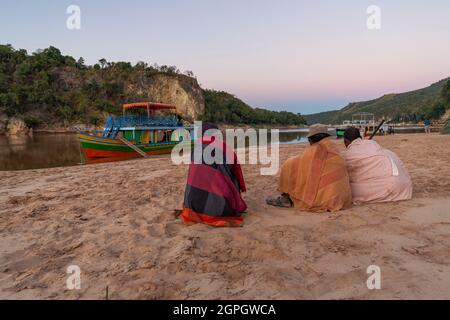 Madagascar, Menabe region, Bemaraha massif, the Tsiribihina river, barge and his crew in the early morning Stock Photo