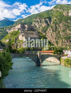 The scenographic Fort Bard in Aosta Valley, northern Italy, on a sunny summer morning. Stock Photo