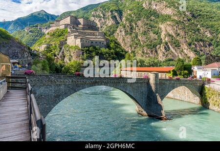 The scenographic Fort Bard in Aosta Valley, northern Italy, on a sunny summer morning. Stock Photo