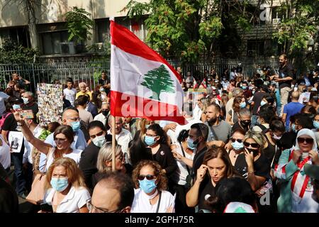 Beirut, Lebanon. 29th Sep, 2021. Families of Beirut Port blast's victims protest by the Palace of Justice against the suspension of the investigation regarding the explosion, Beirut, Lebanon, September 29 2021. About 300 protesters gathered to protest against the effort of top politicians to remove lead investigator Judge Tarek Bitar from the probe. (Photo by Elisa Gestri/Sipa USA) Credit: Sipa USA/Alamy Live News Stock Photo