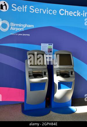 Inside Birmingham International Train Station self service check-in machines Stock Photo
