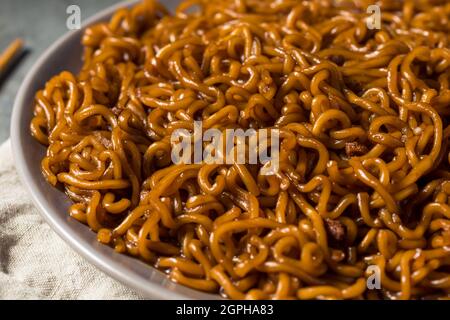 Homemade Korean JJajang Black Bean Noodles with Chopsticks Stock Photo