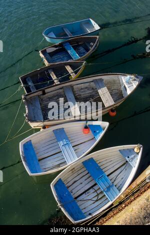 Ariel View Of Six Small Tender Boats In St Ives Harbour. Stock Photo