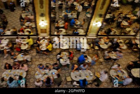 RIO DE JANEIRO, BRAZIL - JULY 22, 2017: Blurred image of people having lunch in a famous pastry shop: 'Confeitaria Colombo' Stock Photo