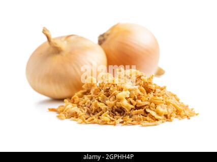 Pieces of fried onions isolated on white background. Stock Photo
