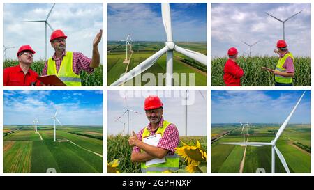 Engineer in Safety Hard Hat Showimg Thumb up Against Wind Turbines. Engineer Holding Clipboard Standing With Coworker at Wind Farm. Stock Photo