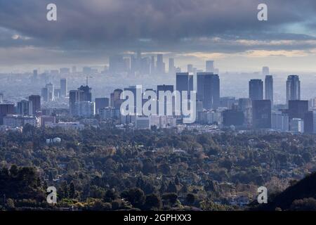 Stormy sky view of Century City with downtown Los Angeles in the background. Stock Photo