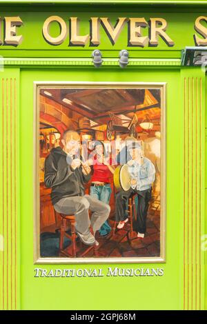 Traditional musicians art panel outside Oliver St.John Gogarty's Bar, Anglesea Street, Temple Bar, Dublin, Republic of Ireland Stock Photo
