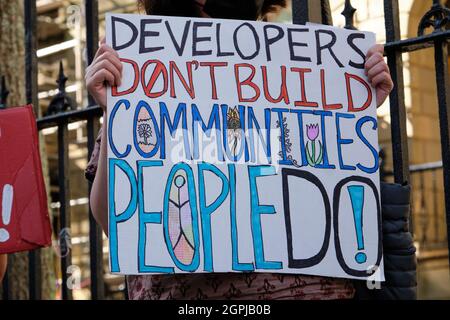 Halifax, Canada. . Rally to demand provincial rent control as housing crisis increases in Nova Scotia. Sign against big housing developers Stock Photo