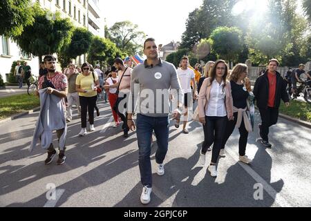 Ljubljana, Slovenia. 29th Sep, 2021. Protesters march on the streets of Ljubljana during the demonstration.Thousands of people protested against the government, covid measures, wearing of face masks, vaccines and RVT green pass (Recovered-Vaccinated-Tested) condition in Ljubljana, Slovenia. Credit: SOPA Images Limited/Alamy Live News Stock Photo