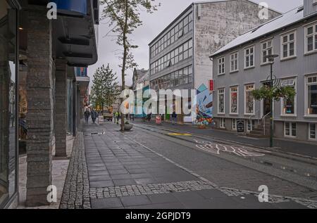 Reykjavik, Iceland – September 22, 2021:  Shops and businesses in the downtown district on a rainy day Stock Photo