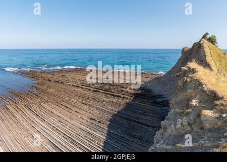 Flysch rocks in Sakoneta beach, along the northern coastline in the Basque Country Stock Photo