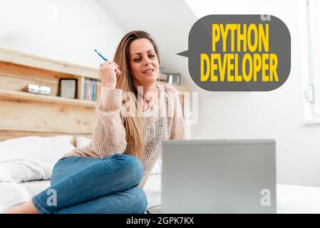 Conceptual caption Python Developer. Business concept responsible for writing serverside web application logic Casual Internet Surfing, Student Stock Photo
