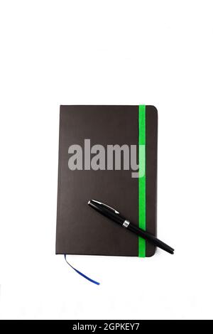 black notebook and pen on white background Stock Photo