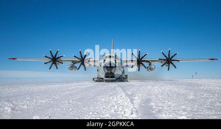 An LC-130 Skibird assigned to the 109th Airlift Wing gets ready for take off at Raven Camp on the Greenland Icecap. Raven Camp is used to train members on landing on ice runways, polar airdrops and operating in the snow and ice conditions. (U.S. Air National Guard photo by Maj. David Price) Stock Photo