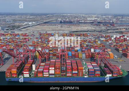 Cargo container vessels ships are backlogged at the Port of Long Beach, Wednesday, Sept. 29, 2021, in Long Beach, Calif.  = Stock Photo