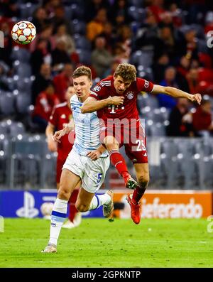 Munich, Germany. 29th Sep, 2021. Thomas Mueller (R) of Bayern Munich vies with Sergiy Sydorchuk of Dynamo Kyiv during an UEFA Champions League Group E 2nd round match between Bayern Munich of Germany and Dynamo Kyiv of Ukraine in Munich, Germany, on Sept. 29, 2021. Credit: Philippe Ruiz/Xinhua/Alamy Live News Stock Photo