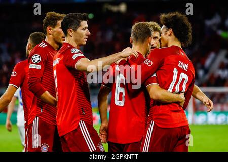 Munich, Germany. 29th Sep, 2021. Leroy Sane (1st R) of Bayern Munich celebrates his scoring with teammates during an UEFA Champions League Group E 2nd round match between Bayern Munich of Germany and Dynamo Kyiv of Ukraine in Munich, Germany, on Sept. 29, 2021. Credit: Philippe Ruiz/Xinhua/Alamy Live News Stock Photo