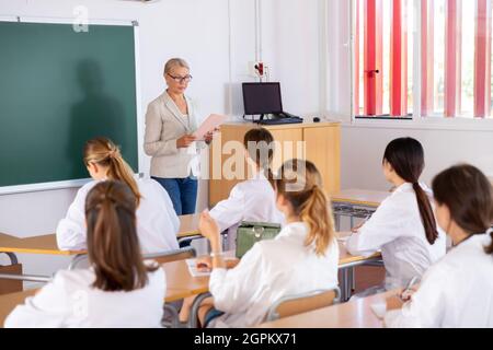 Teacher lecturing to medical students Stock Photo