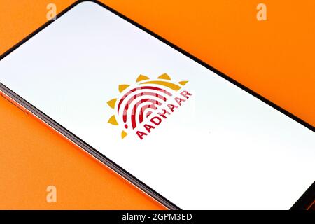 West Bangal, India - September 28, 2021 : Aadhaar logo on phone screen stock image. Stock Photo