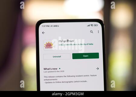 West Bangal, India - September 28, 2021 : Aadhaar logo on phone screen stock image. Stock Photo