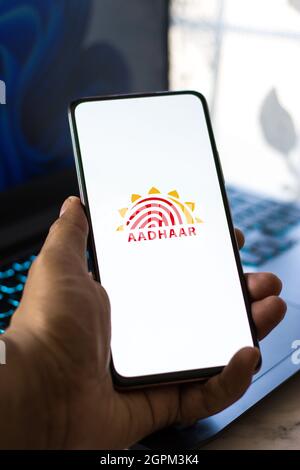 West Bangal, India - September 28, 2021 : Aadhaar logo on phone screen stock image. Stock Photo