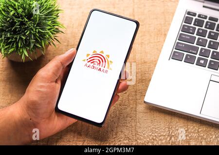 West Bangal, India - September 28, 2021 : Aadhaar logo on phone screen stock image. Stock Photo