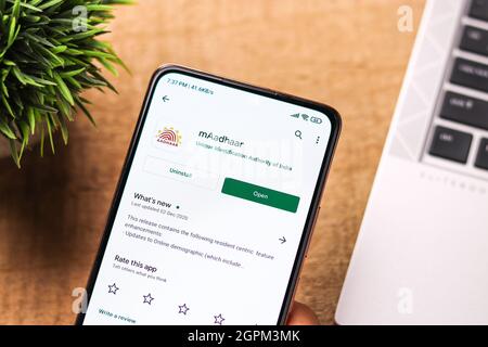 West Bangal, India - September 28, 2021 : Aadhaar logo on phone screen stock image. Stock Photo