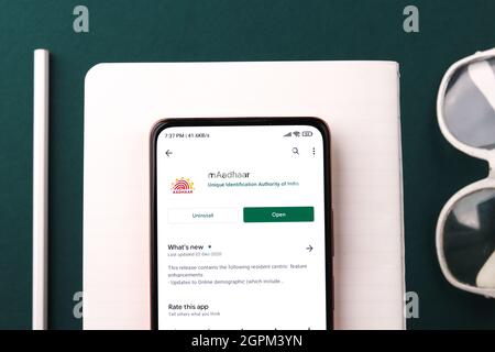 West Bangal, India - September 28, 2021 : Aadhaar logo on phone screen stock image. Stock Photo